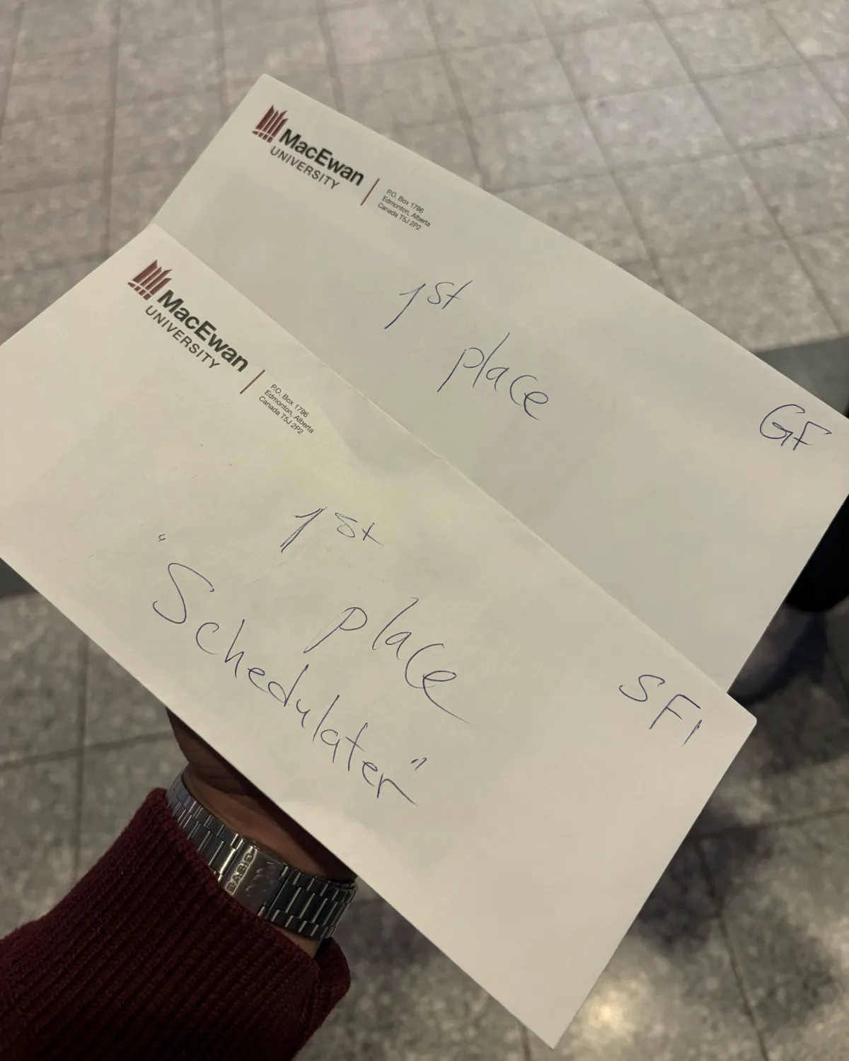 Two MacEwan University notes reading "1st place Schedulater SF1" and "1st place GF"